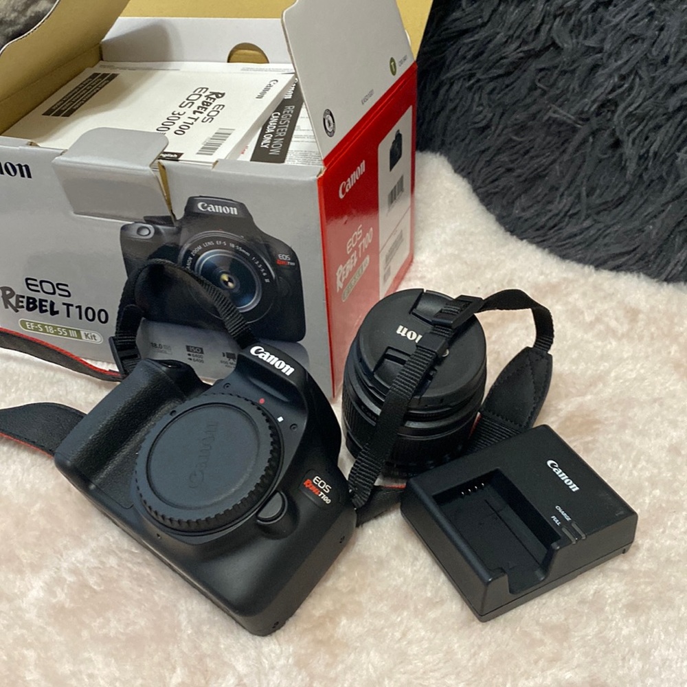 Canon Rebel T100 EF-S 18-55 III kit gently used for a semester!